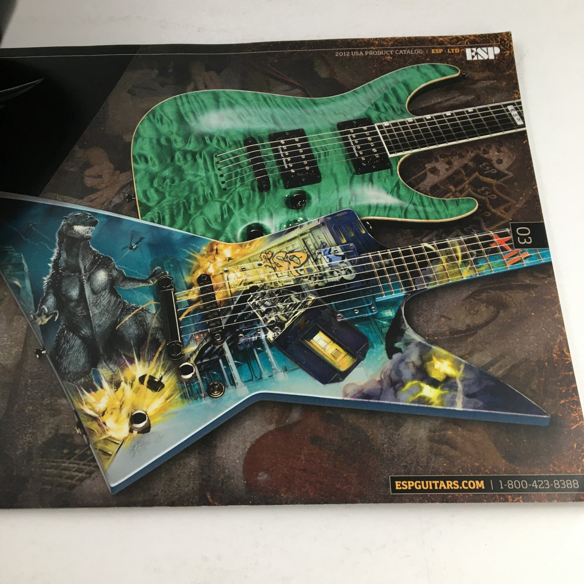 Artistic page showcasing ESP guitars in the 2012 USA Product Catalog, featuring a vibrant green guitar and a uniquely designed guitar with graphics.