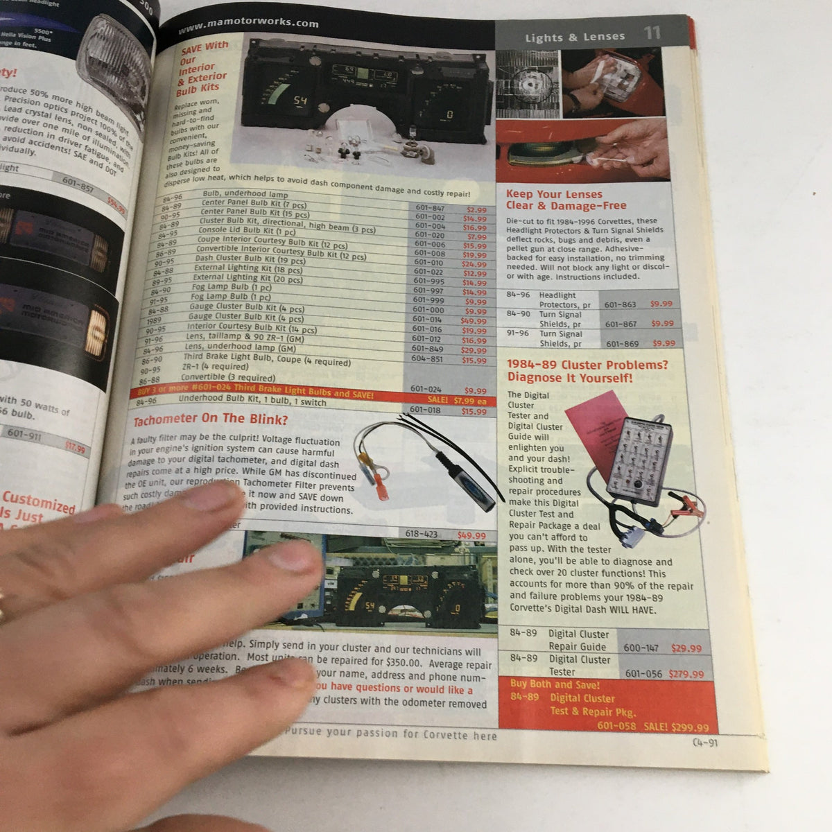 Interior page from Mid America Motorworks Corvette & Chevrolet 2005 Parts & Accessories Catalog, featuring lights and lenses for Corvette models, with a table of specifications.