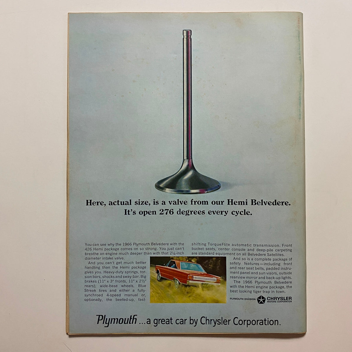 VTG Car Life Magazine May 1966 Vol 13 No. 4 advertisement featuring a valve from the Hemi Belvedere, showcasing automotive engineering, with descriptions of its performance metrics and features.
