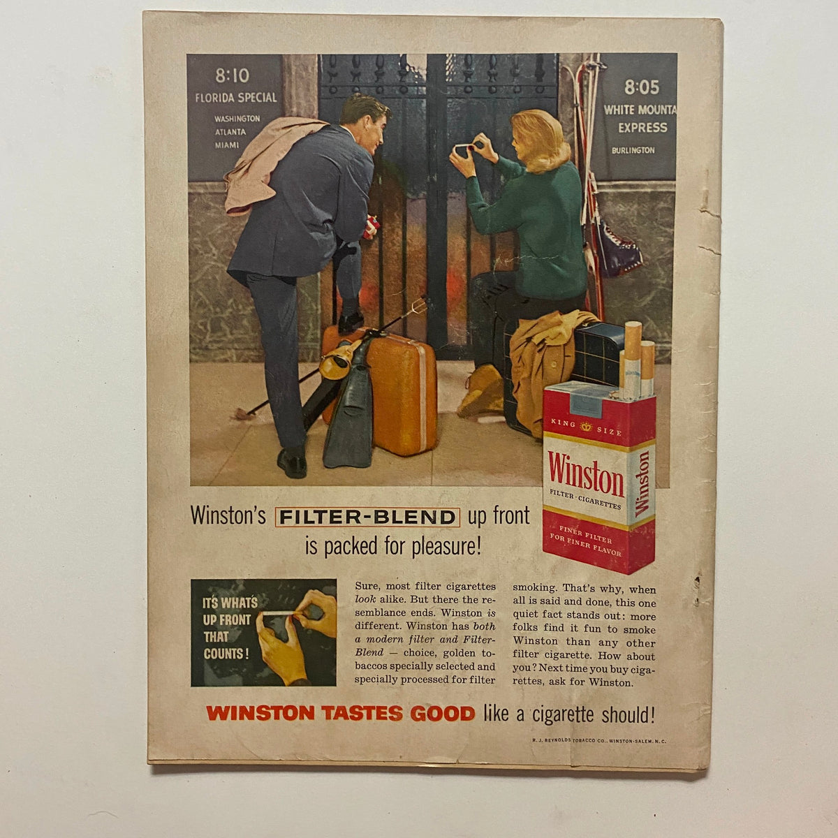 Advertisement page from the January 1960 Motor Life Magazine promoting Winston's filter cigarettes, featuring a couple at a train station, illustrating 1960s marketing style.