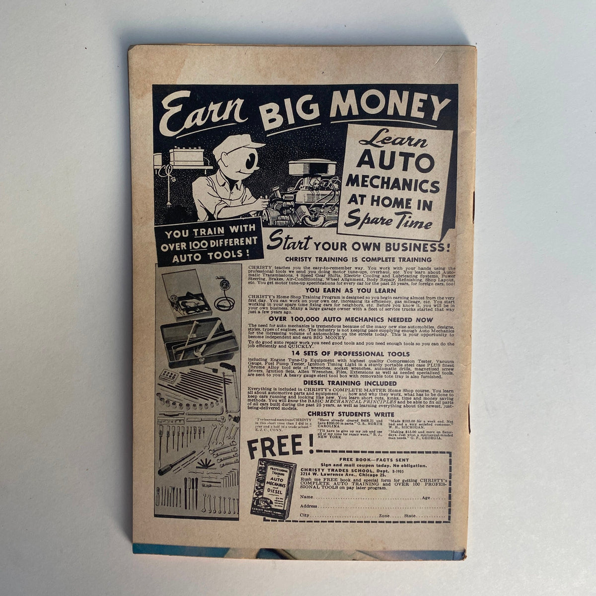 Back cover of VTG Rodding & Re-Styling Magazine October 1962 advertising an auto mechanics training program, showcasing tools and educational opportunities for aspiring mechanics.