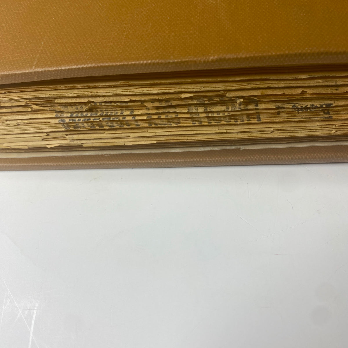 Close-up of the binding and edge of The New York Times Library Edition Bound Magazine July-August 1969, showcasing well-worn pages and library marking.