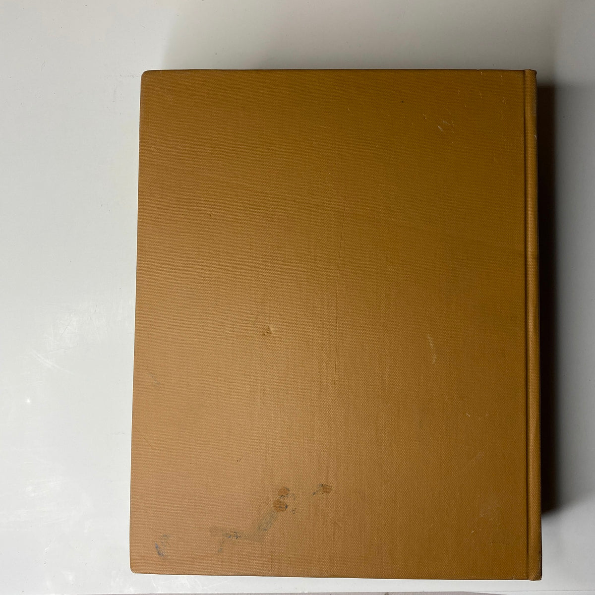 Top view of 'The New York Times Bound Magazine 1969 March - April' illustrated in a solid cover design with minor wear visible on the surface.
