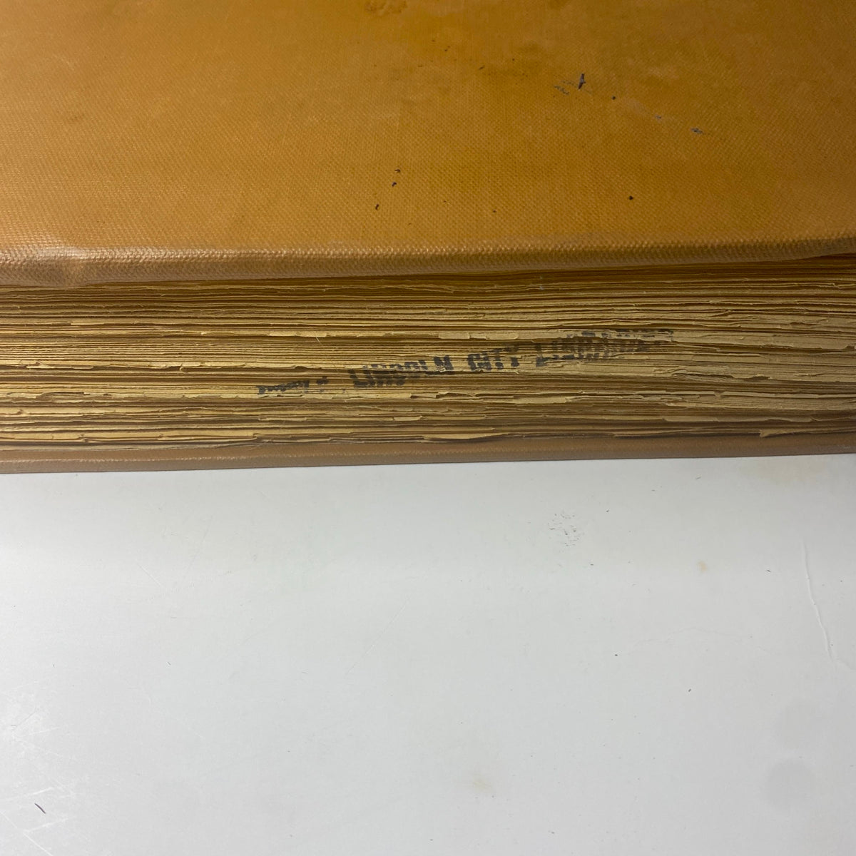 Close-up view of the spine of The New York Times Bound Magazine 1969 November - December, showing the binding and stamped property details.