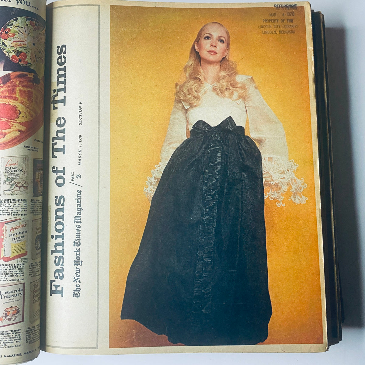 A fashion section from 'The New York Times Library Edition Bound Magazine 1970 March - April,' featuring a woman in a stylish dress against a bright yellow background, dated March 1, 1970.