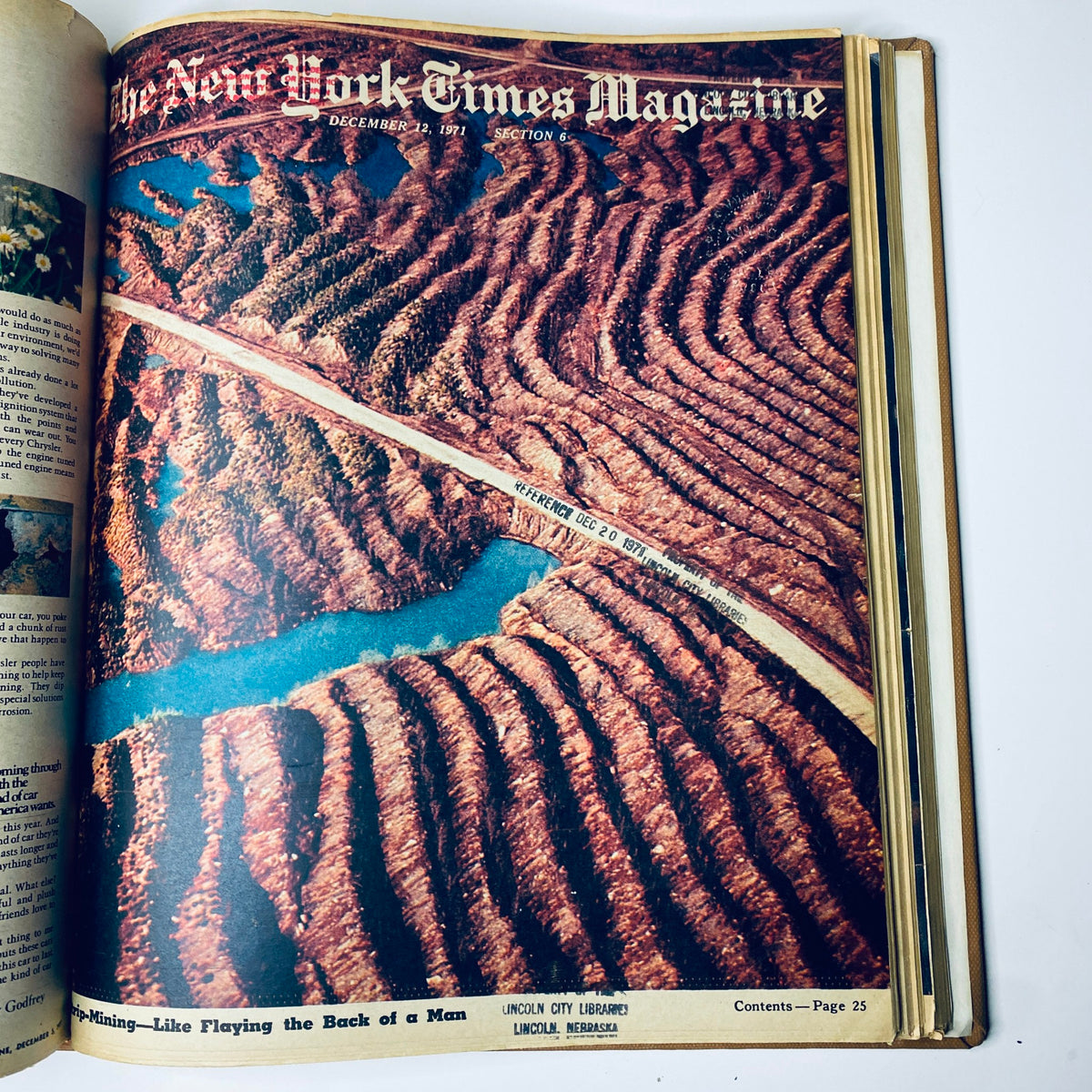 An aerial photograph featured in the New York Times Magazine, December 12, 1971, depicting a vast landscape with twisted roads set against a strikingly colorful terrain. The image exemplifies innovative photography from the era.