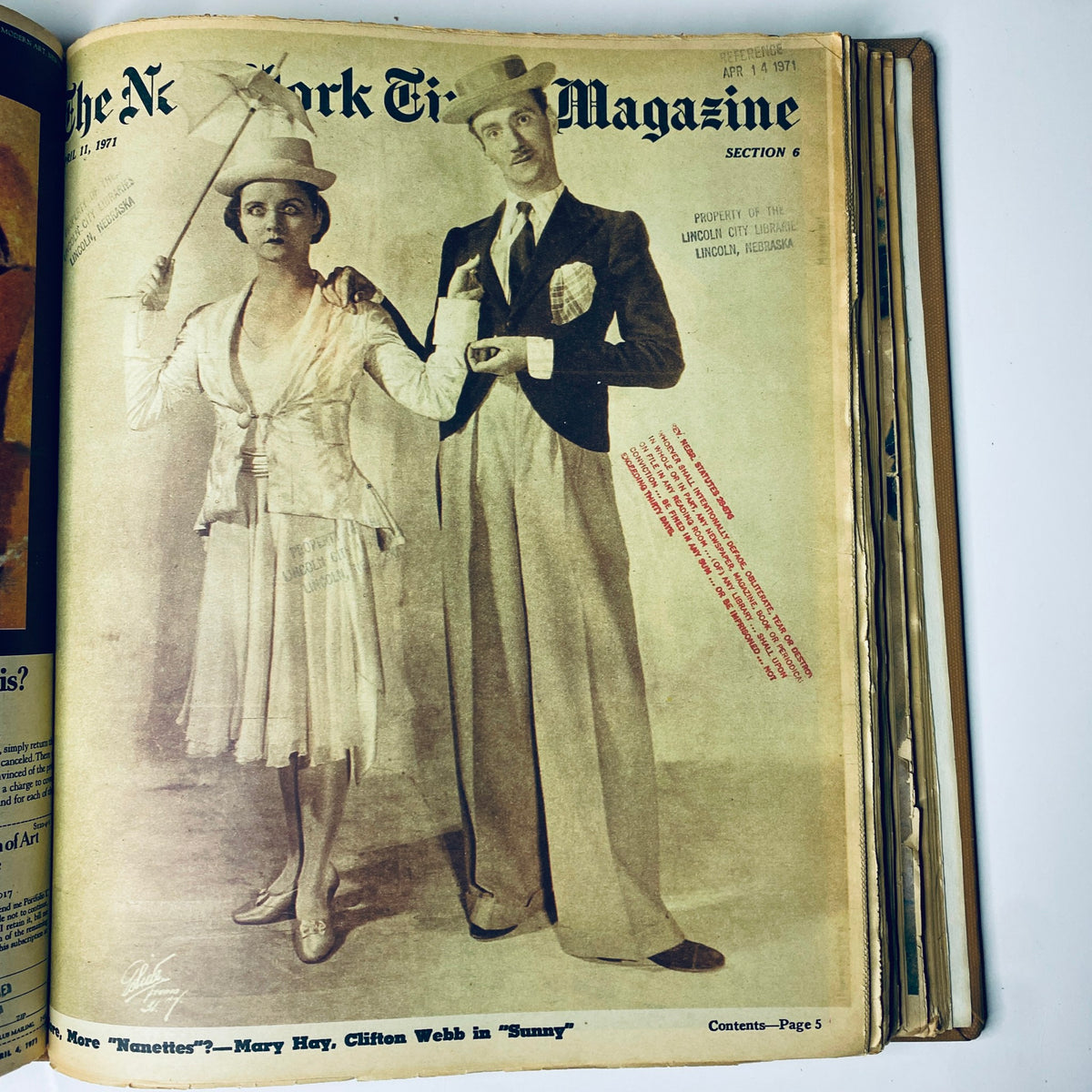 Cover of The New York Times Magazine, April 11, 1971, featuring a man and woman in vintage fashion, symbolizing styles from the early 1970s, highlighting cultural trends of that era.