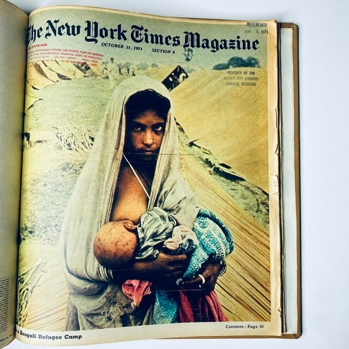The New York Times Library Edition Bound Magazine 1971 September - October showcasing a cover photo of a woman holding a baby in a refugee camp, dated October 31, 1971.