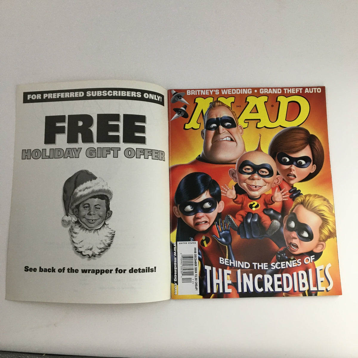 Cover image of Mad Magazine December 2004 #448 featuring characters from The Incredibles, showcasing humor and style typical of this vintage magazine.