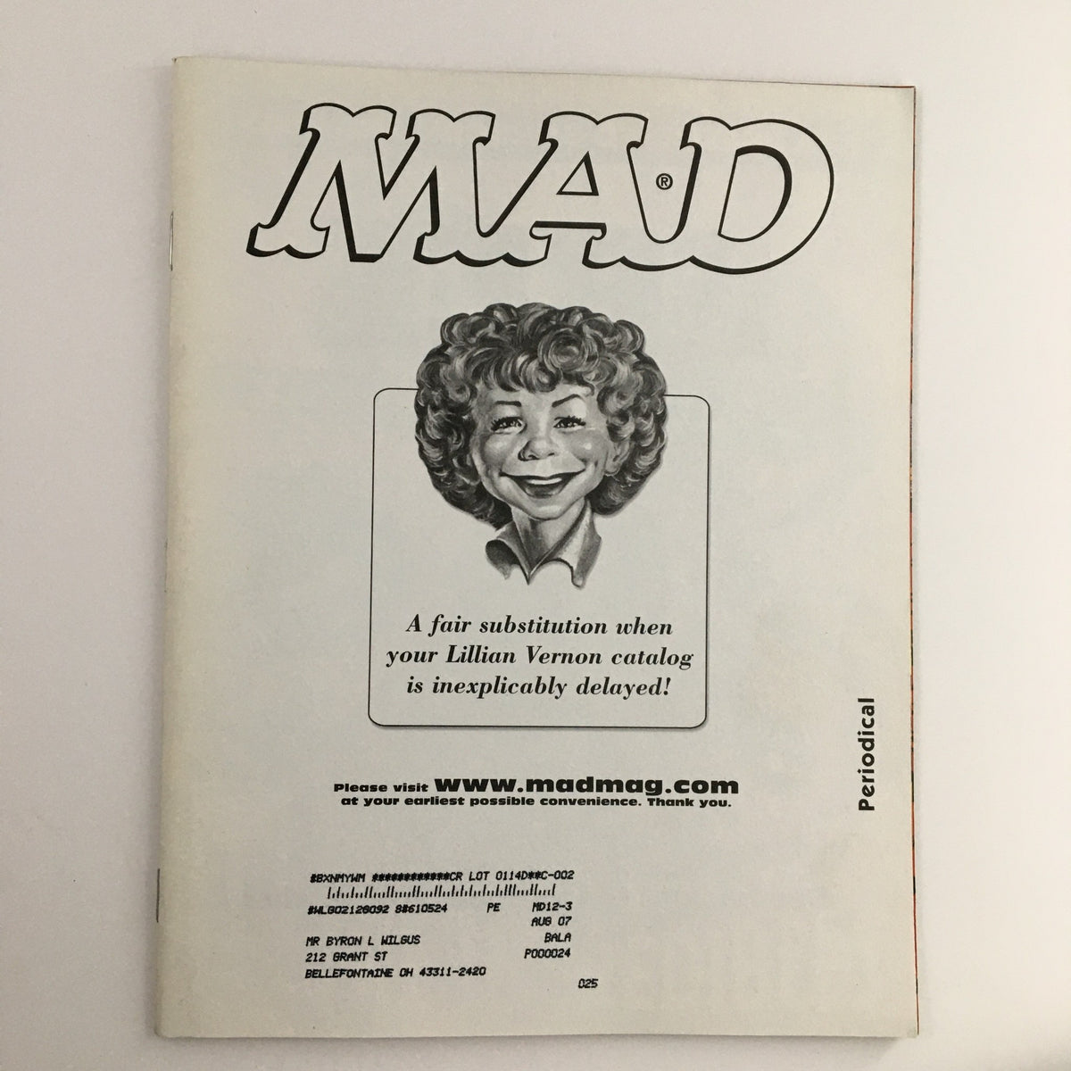 Mad Magazine December 2004 #448 - Cover featuring a humorous caricature and advertisement, showcasing the whimsical essence of this vintage issue.