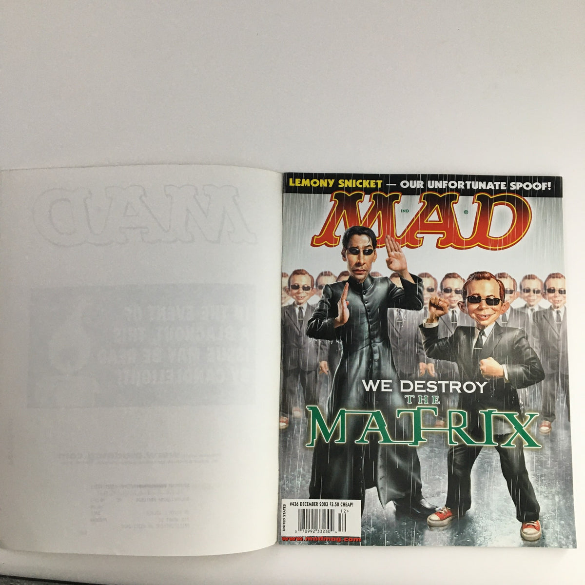 Cover of Mad Magazine December 2003 #436 featuring a spoof on The Matrix with characters resembling Neo and Agent Smith, labeled 'We Destroy The Matrix', and described as a Very Fine VF 8.0 subscription copy.