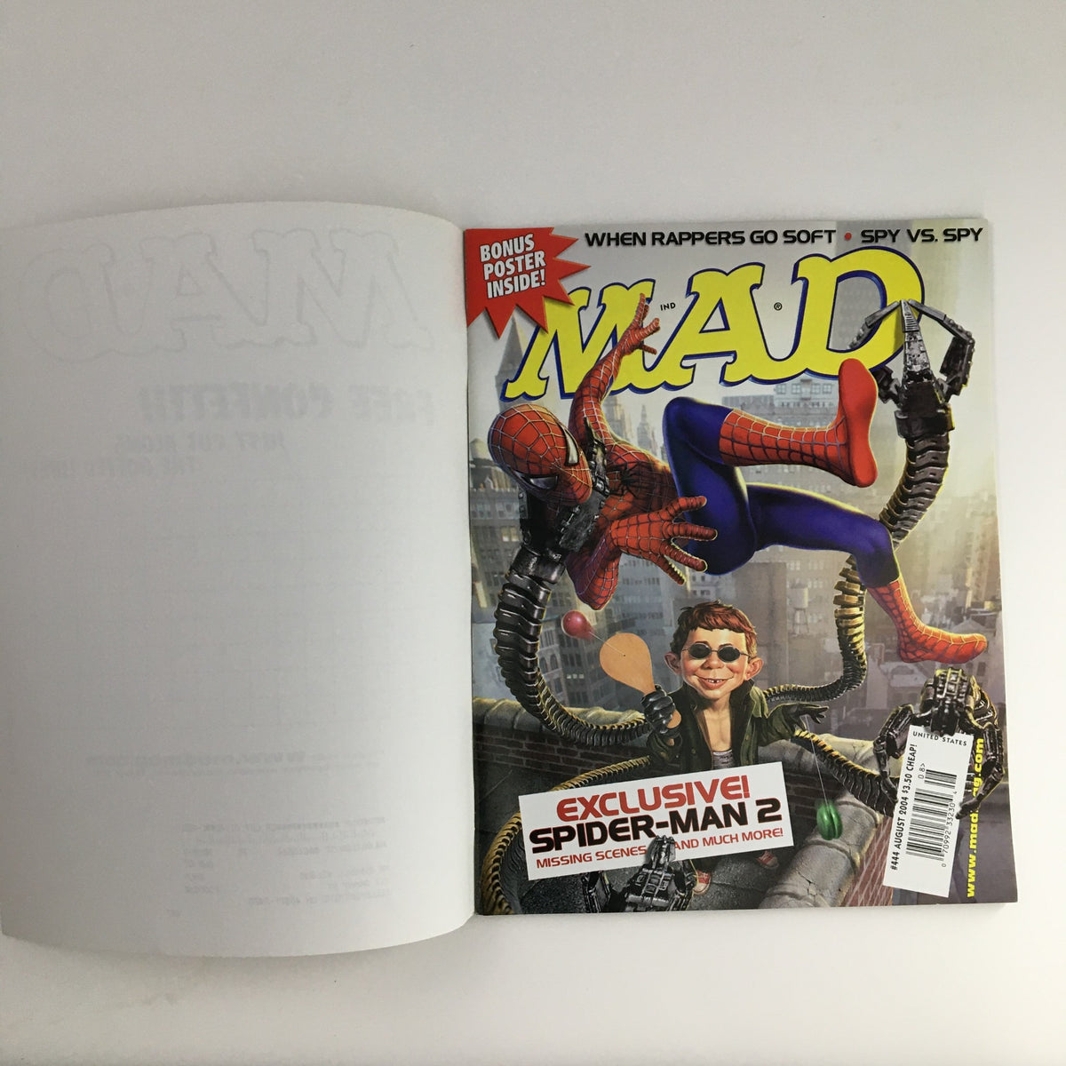Cover of Mad Magazine August 2004 #444 featuring a Spider-Man 2 parody with Spider-Man and a character in a humorous pose, showcasing the iconic Mad Magazine style.