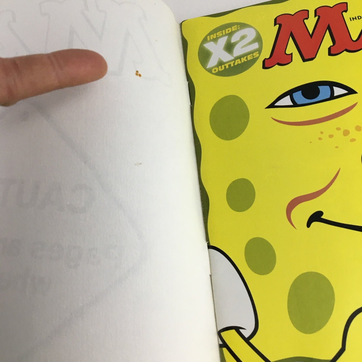 Interior view of Mad Magazine May 2003 #429 featuring SpongeBob SquarePants, showcasing the magazine's humorous content with an illustration of SpongeBob.