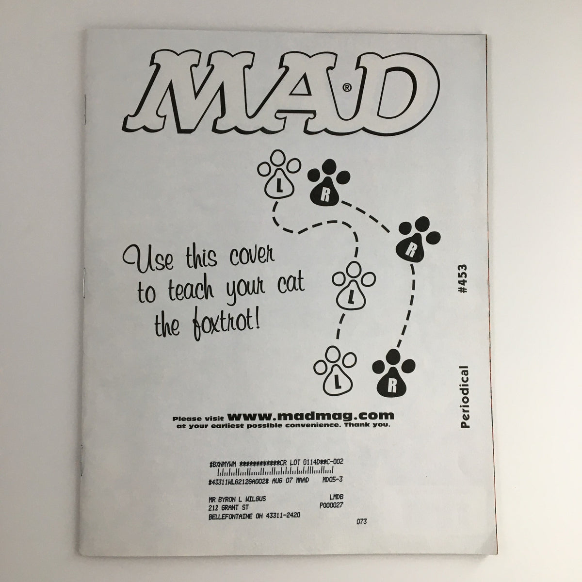 Back cover of Mad Magazine May 2005 #453 showcasing an advertisement for a playful cat-related activity.