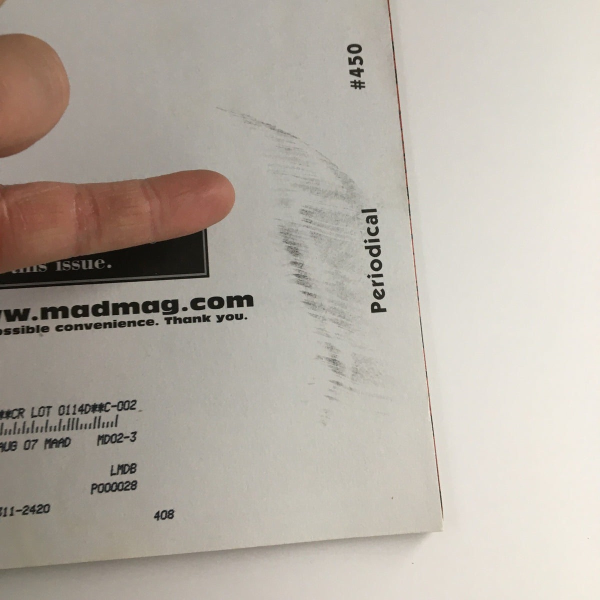 Back cover of Mad Magazine February 2005 #450 Super Bowl Issue showing a finger pointing at the magazine content. This issue is a collectible in Fine FN 6.0 condition.