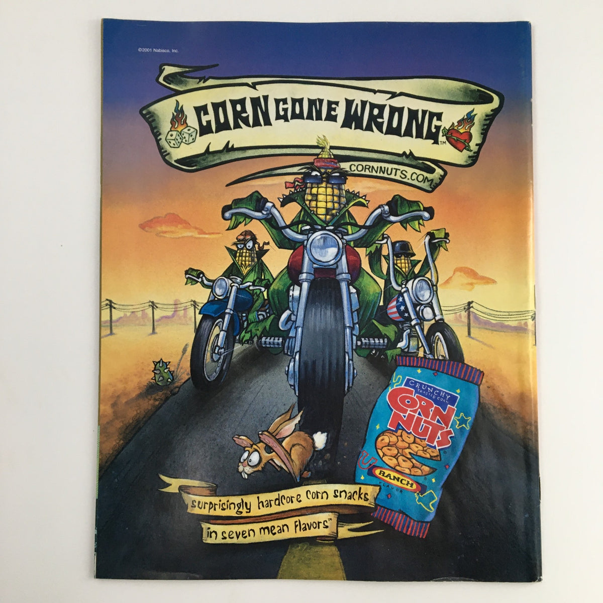 Back cover of Mad Magazine April 2002 #416 showcasing an advertisement for 'Corn Gone Wrong' snacks with a colorful illustration of a motorcycle.