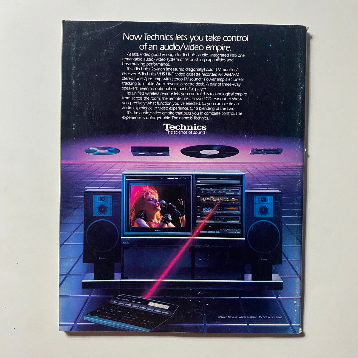 Back cover of Omni Magazine December 1985 showcasing Technics audio/video equipment, highlighting the integration of audio and video technologies in home entertainment.