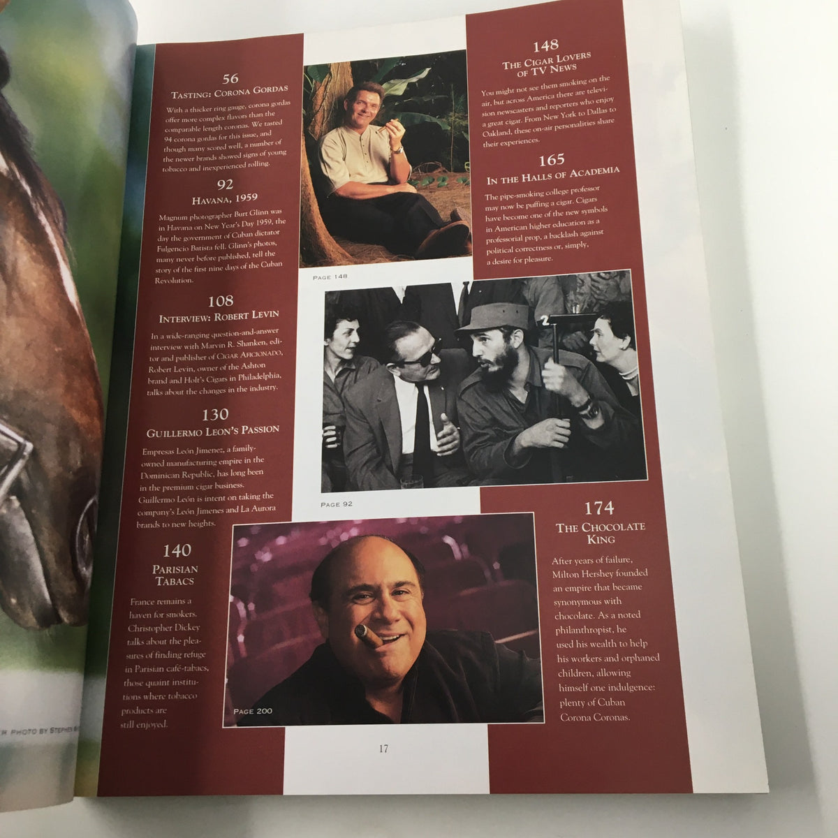 Another page from Cigar Afficionado Magazine Winter 1996, displaying article highlights with images, including a notable photo of Danny DeVito and references to cigar culture.