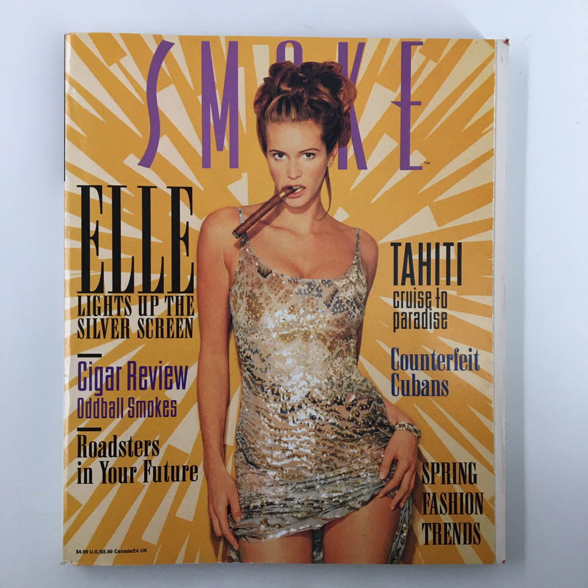 Cover of Smoke Magazine Spring 1997 featuring Elle Macpherson, highlighting the title 'Elle Lights Up the Silver Screen'. The design includes bright colors and text promoting cigar reviews, spring fashion trends, and travel features.