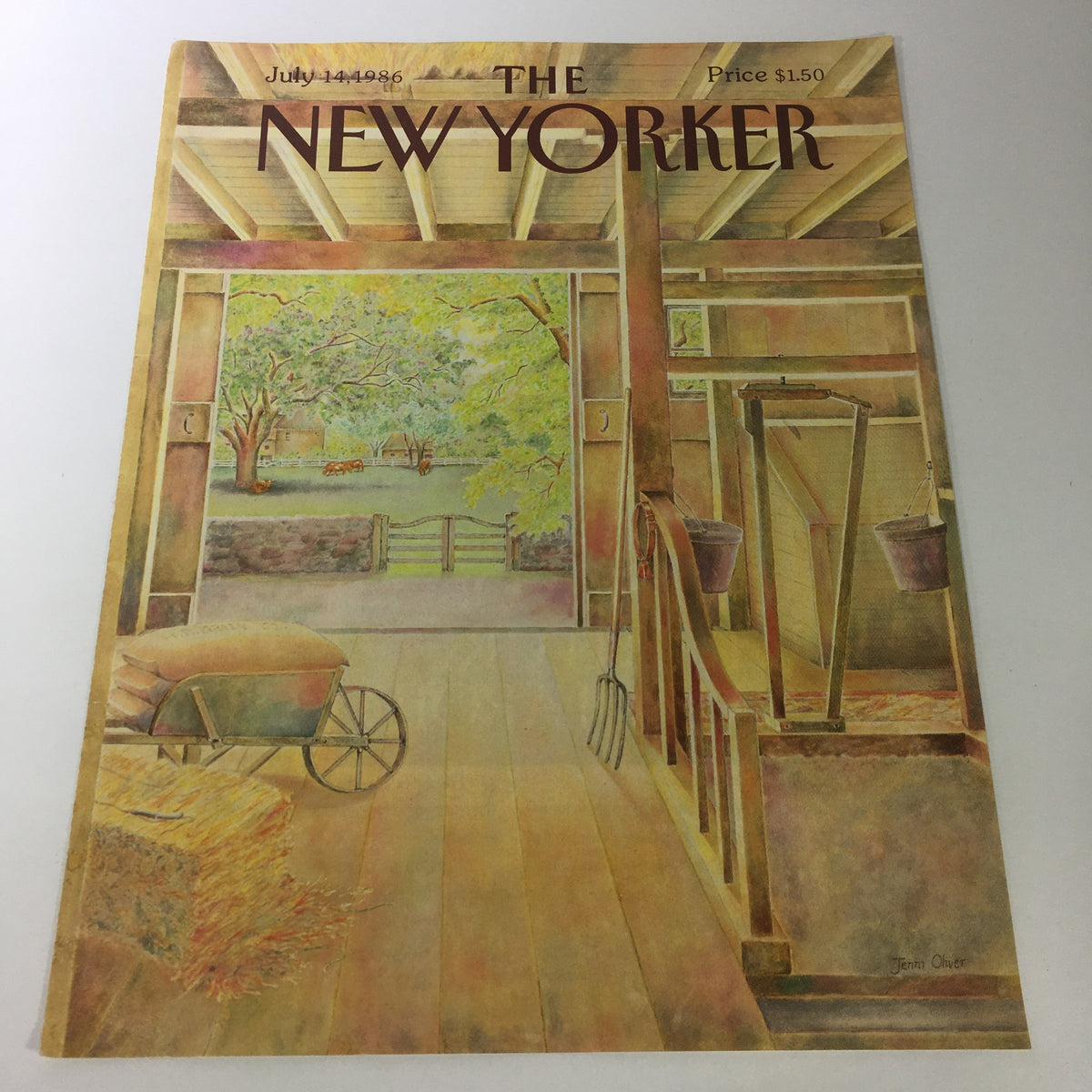 Cover only of The New Yorker Magazine dated July 14, 1986, featuring artwork by Jenni Oliver. The cover showcases a serene barn interior with a view of green fields and a wheelbarrow, perfect for vintage magazine collectors.