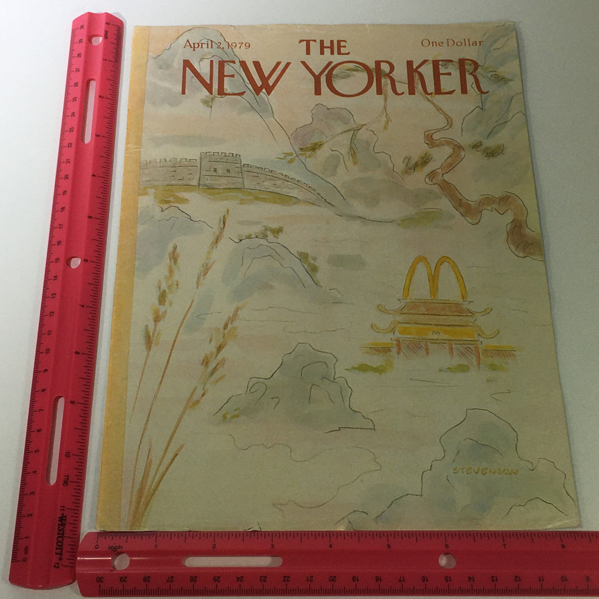 COVER ONLY - The New Yorker Magazine April 2 1979 displayed with a ruler for scale, emphasizing its dimensions and detailed artwork by James Stevenson.