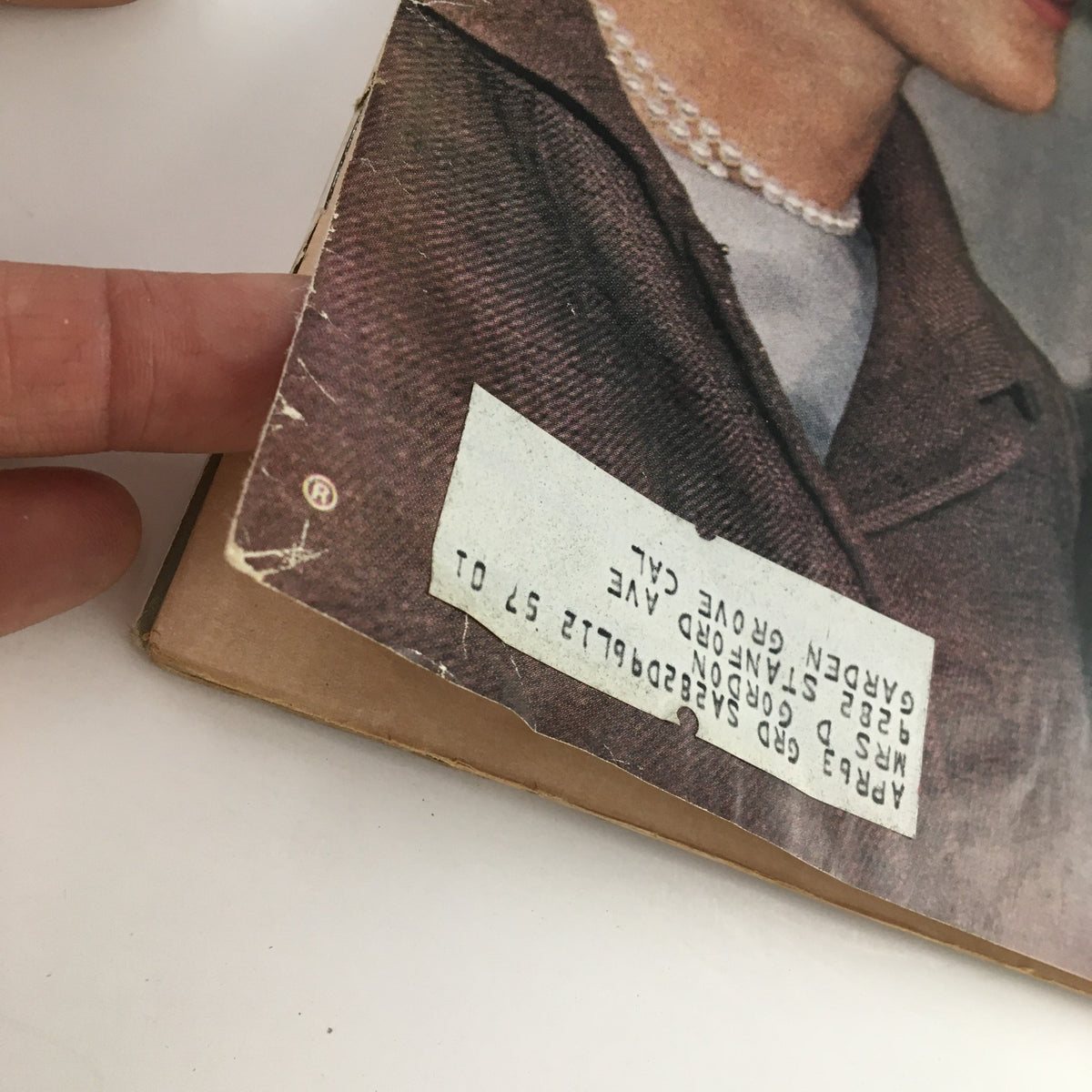 Detailed view of the back cover of Life Magazine May 17 1963, highlighting a signed address label and wear on the magazine.