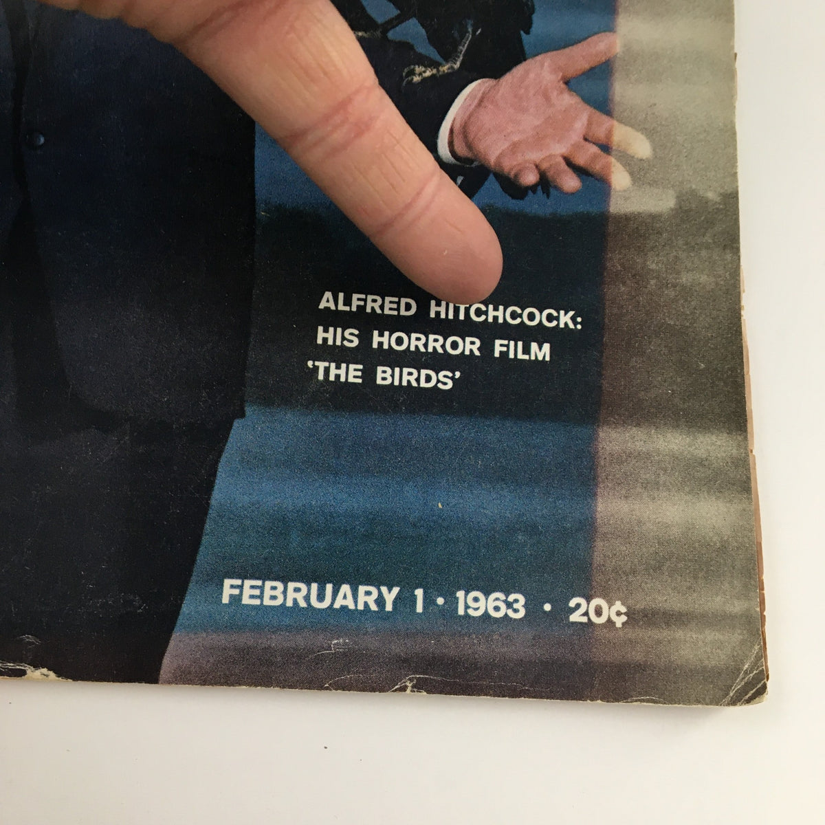 Close-up of the Life Magazine cover from February 1, 1963, displaying text about Alfred Hitchcock's horror film 'The Birds', emphasizing the magazine's vintage appeal.