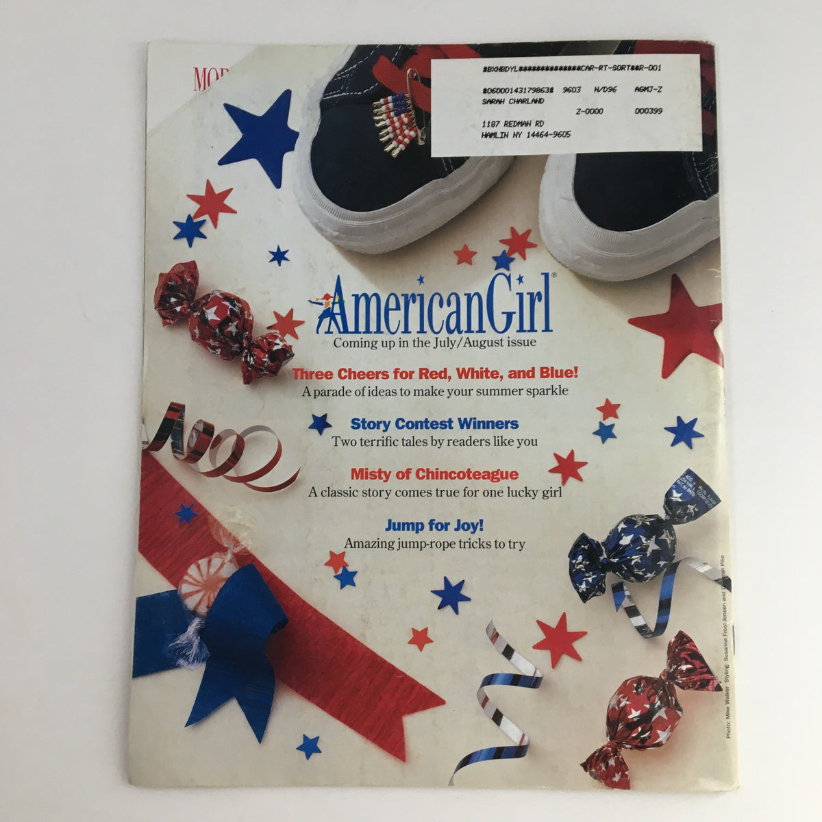 Back cover of American Girl Magazine May 1996 featuring patriotic designs and upcoming content highlights, showcasing the magazine's vibrant community engagement and fun activities.