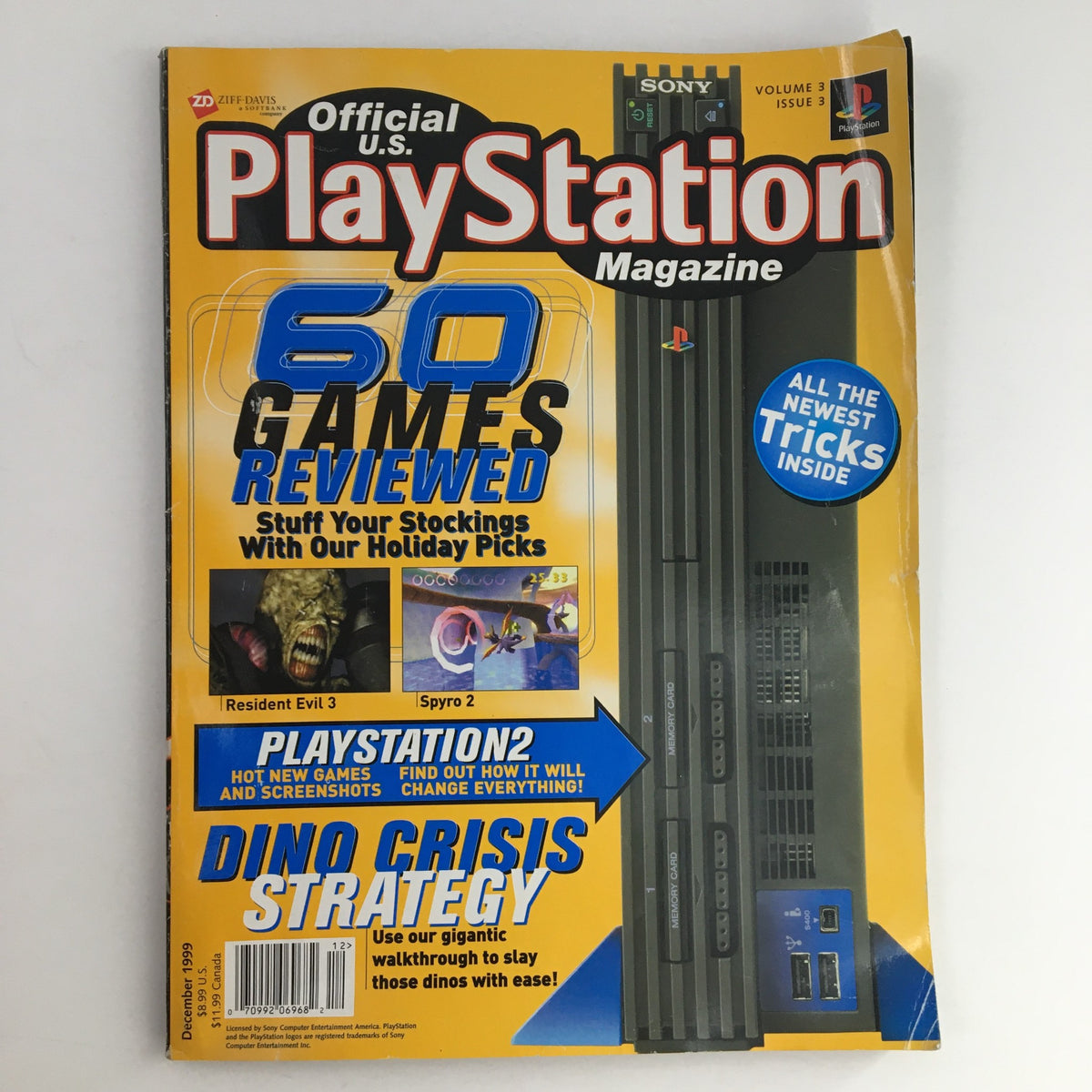 Cover of PlayStation Magazine December 1999 featuring Resident Evil 3 and Spyro 2, showcasing the PlayStation console and promotional text about game reviews.