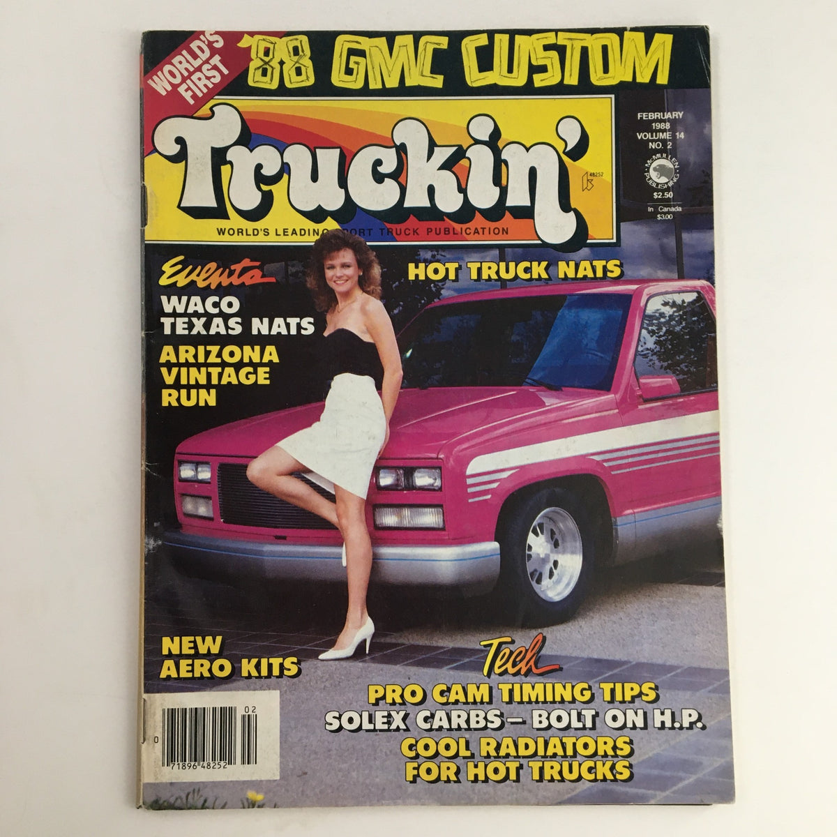 Cover of Truckin' Magazine February 1989 featuring Pro Cam Timing Tip and Arizona Vintage Run, showcasing a woman in a black top and white skirt posing in front of a pink truck with vibrant graphics.