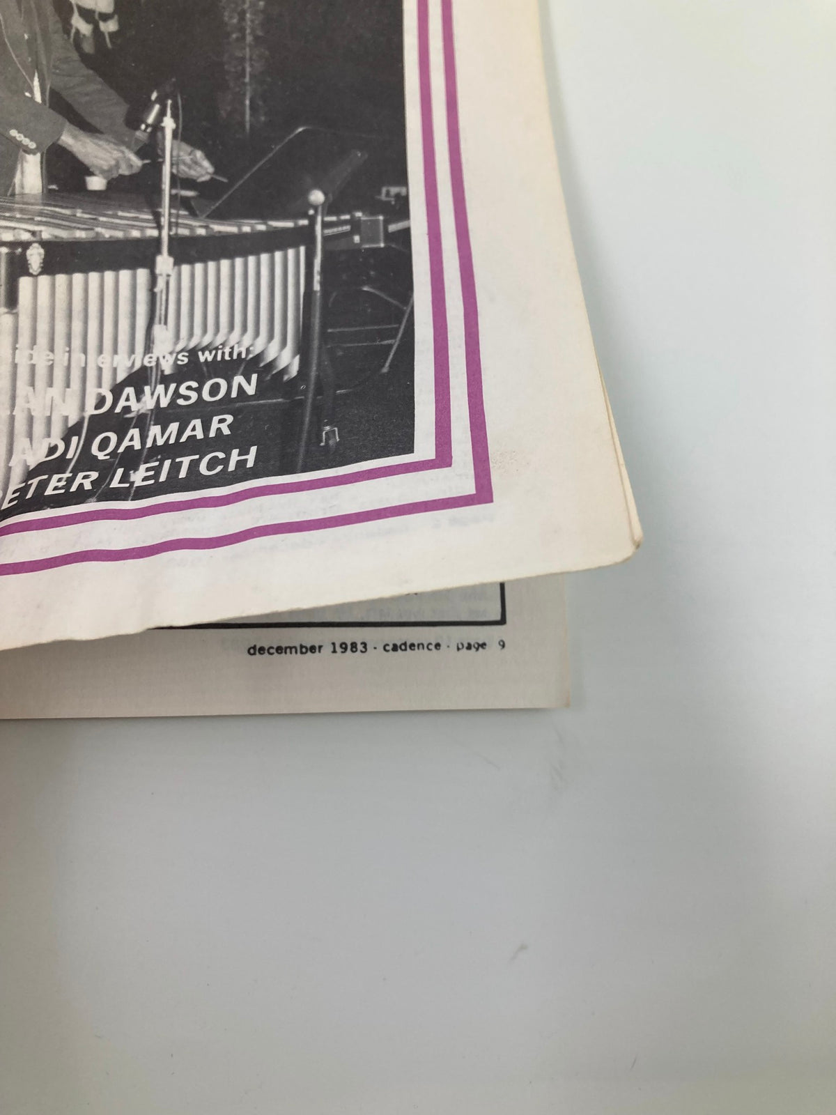 Image of the VTG Cadence Jazz Magazine December 1983 Vol 9 #12 featuring interviews with Adam Dawson and Nadi Qamar, showcasing a musician playing vibraphone with text overlay.