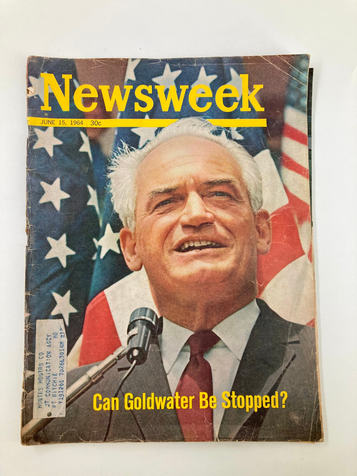 Cover of VTG Newsweek Magazine dated June 15, 1964, featuring a smiling man speaking into a microphone, surrounded by an American flag backdrop, with the headline 'Can Goldwater Be Stopped?'.