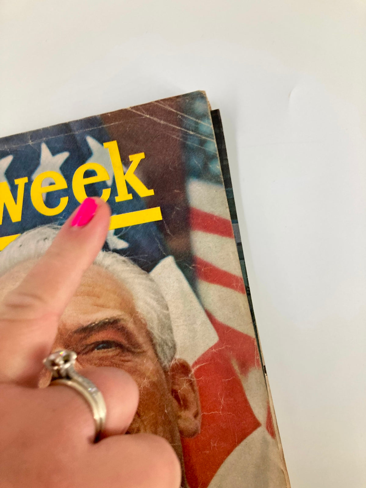 Image showing a hand pointing at the cover of VTG Newsweek Magazine dated June 15, 1964, featuring the prominent question 'Can Goldwater Be Stopped?' and visible age-related wear.