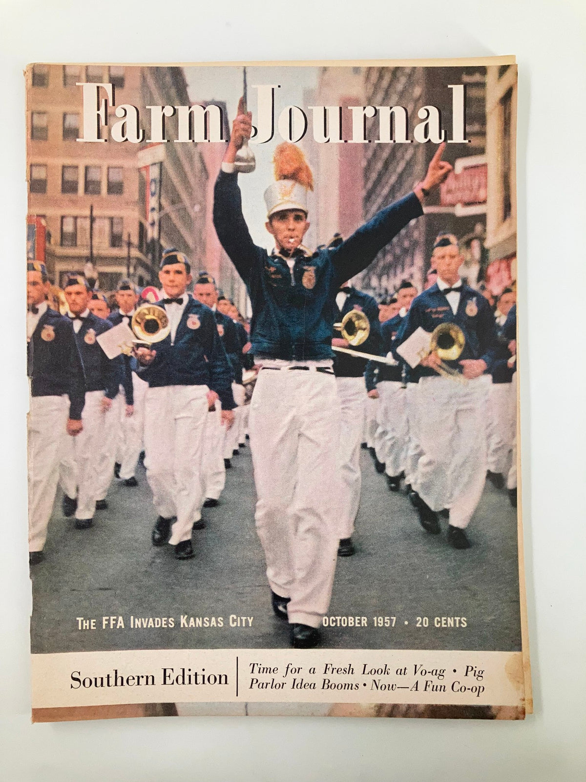 Cover of the VTG Farm Journal Magazine from October 1957, featuring a parade scene with Future Farmers of America (FFA) members in Kansas City, showcasing the theme 'The FFA Invades Kansas City'.