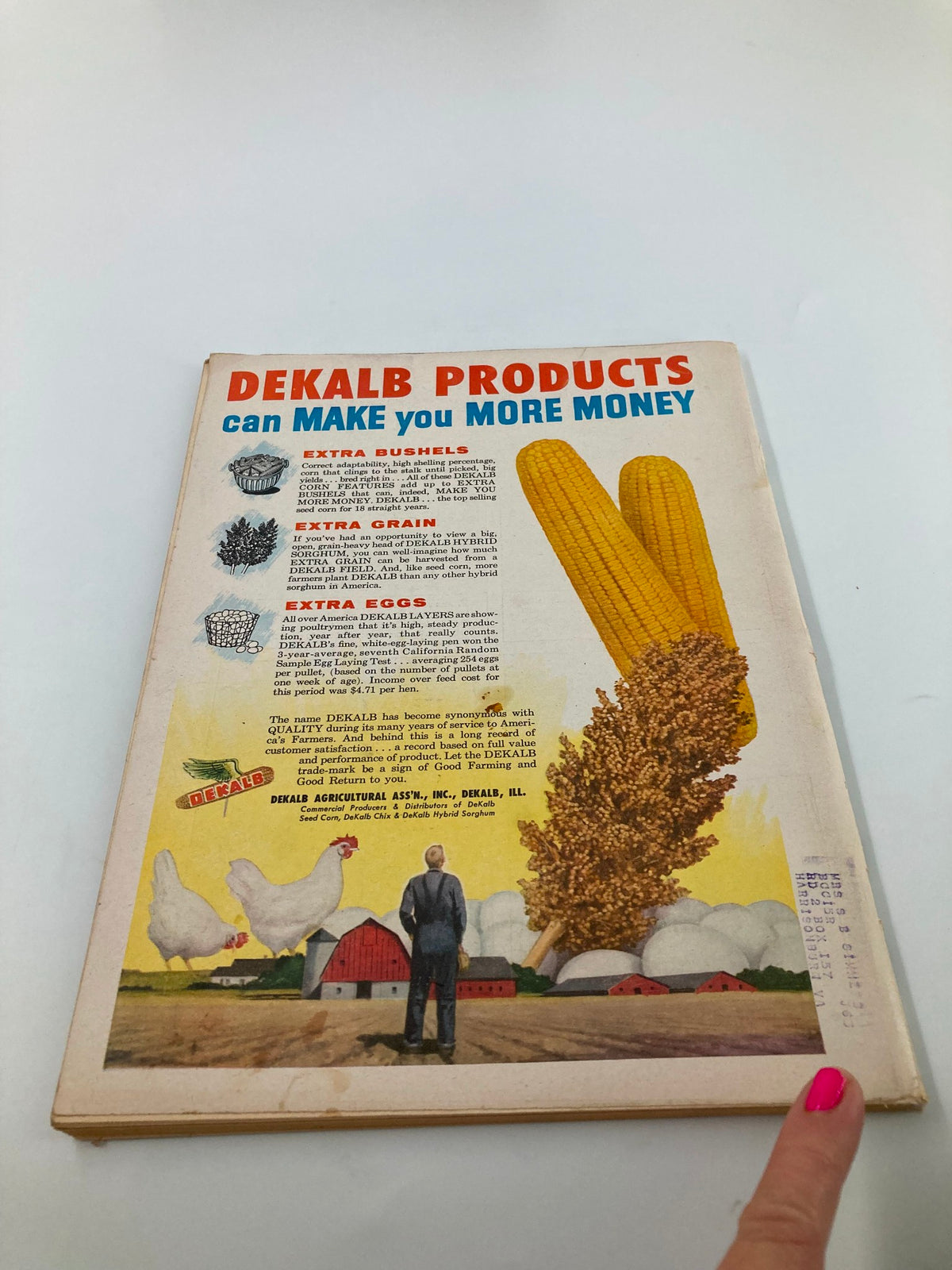 Back cover of the October 1957 VTG Farm Journal Magazine, featuring an advertisement for Dekalb products emphasizing agricultural solutions like extra bushels, grain, and eggs.