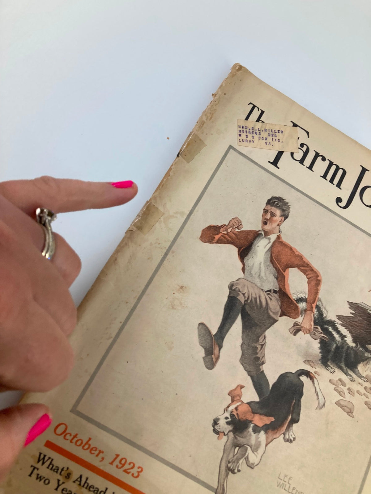 Close-up of the cover of VTG The Farm Journal Magazine October 1923, showing a label and wear indicative of its vintage age.