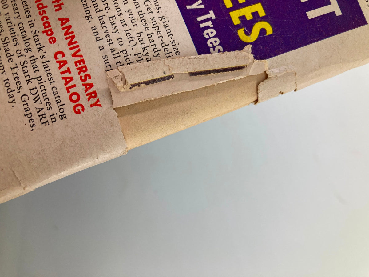 Close-up view of the spine of a Vintage Farm Journal Magazine from January 1967, featuring the theme 'The Power Farming U.S.A. 1967'. The image highlights the magazine's worn edges and labels, showcasing its collectible condition and historical significance in agriculture.