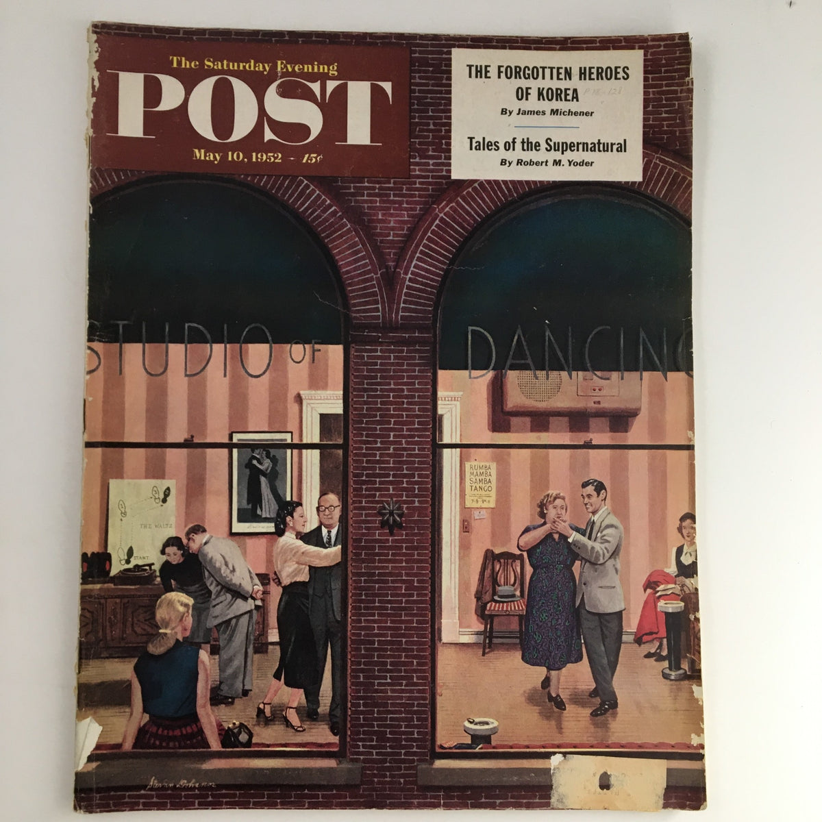 Cover of The Saturday Evening Post from May 10, 1952, showcasing the article 'The Forgotten Heroes of Korea' by James M. Michener. The illustration depicts a vibrant scene of social interactions, with backgrounds featuring a dancing studio and an elegantly dressed couple, reflecting mid-20th century American culture.