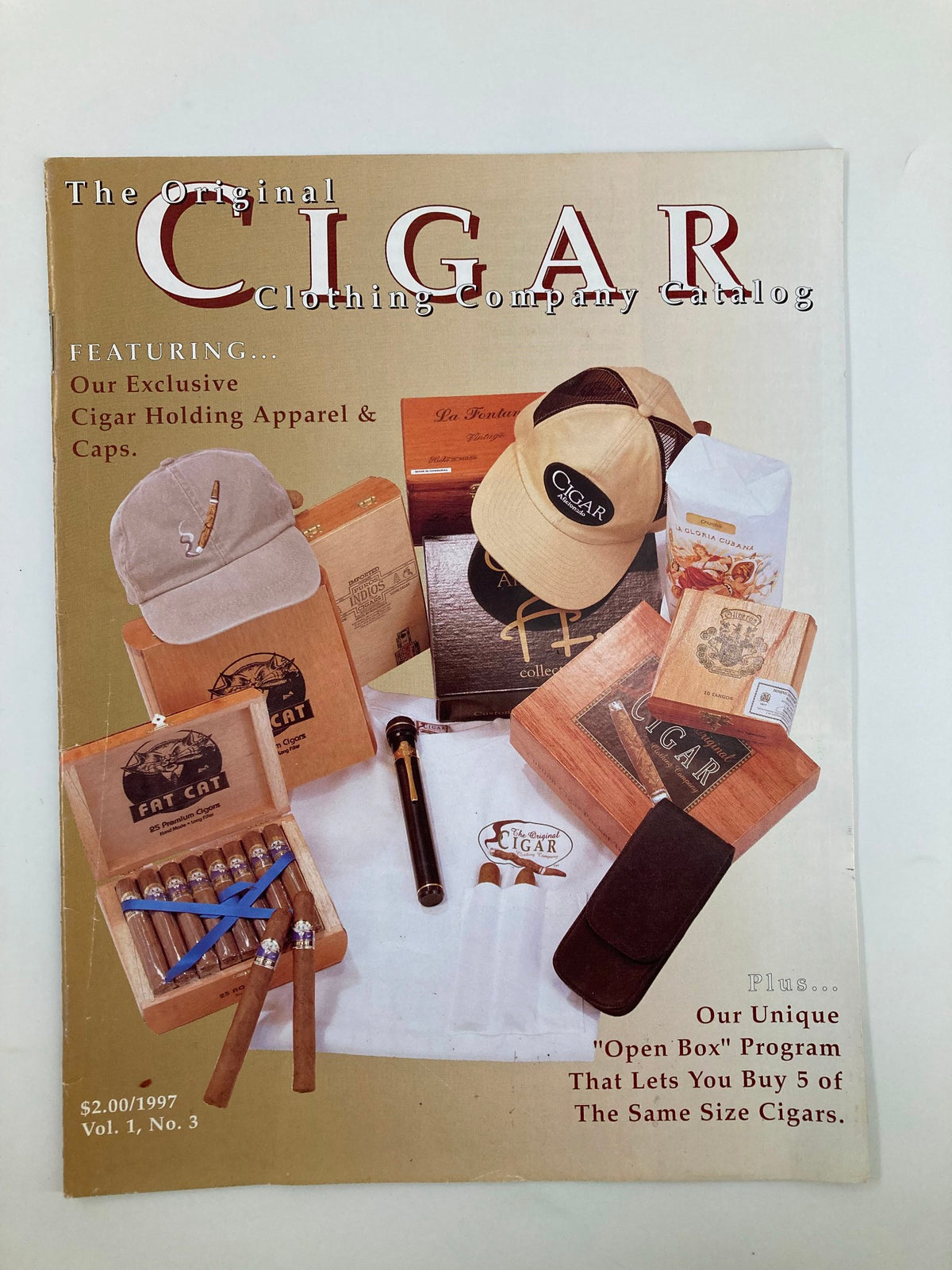 Cover of The Original Cigar Clothing Company Catalog 1997 Vol 1 #3 showcasing cigar holding apparel and caps, featuring various cigar boxes and accessories.