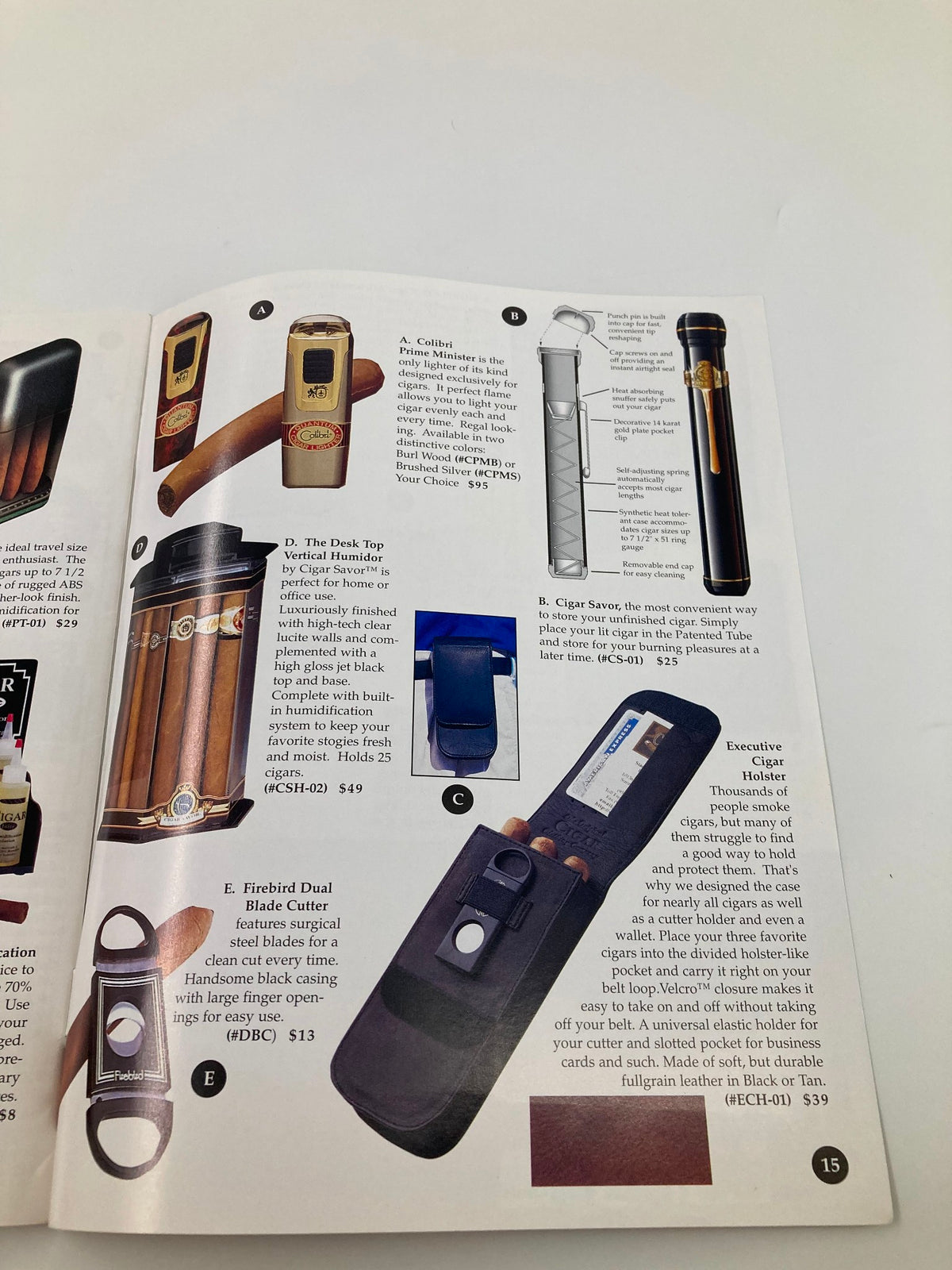 Interior product showcase from The Original Cigar Clothing Company Catalog 1997 Vol 1 #3 featuring cigar accessories such as lighters, cutters, and humidors.