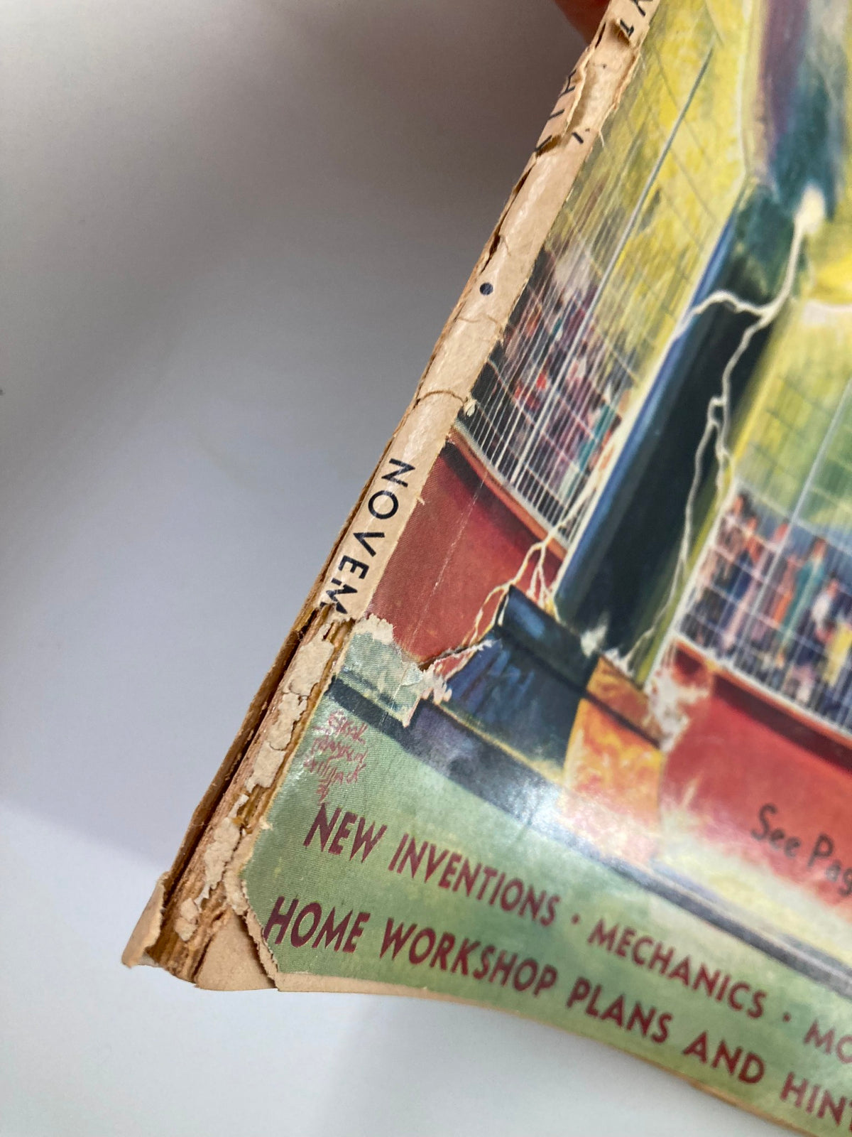Detail of VTG Popular Science Magazine November 1936 showing the month 'November' on the spine, indicating the magazine's historical context.