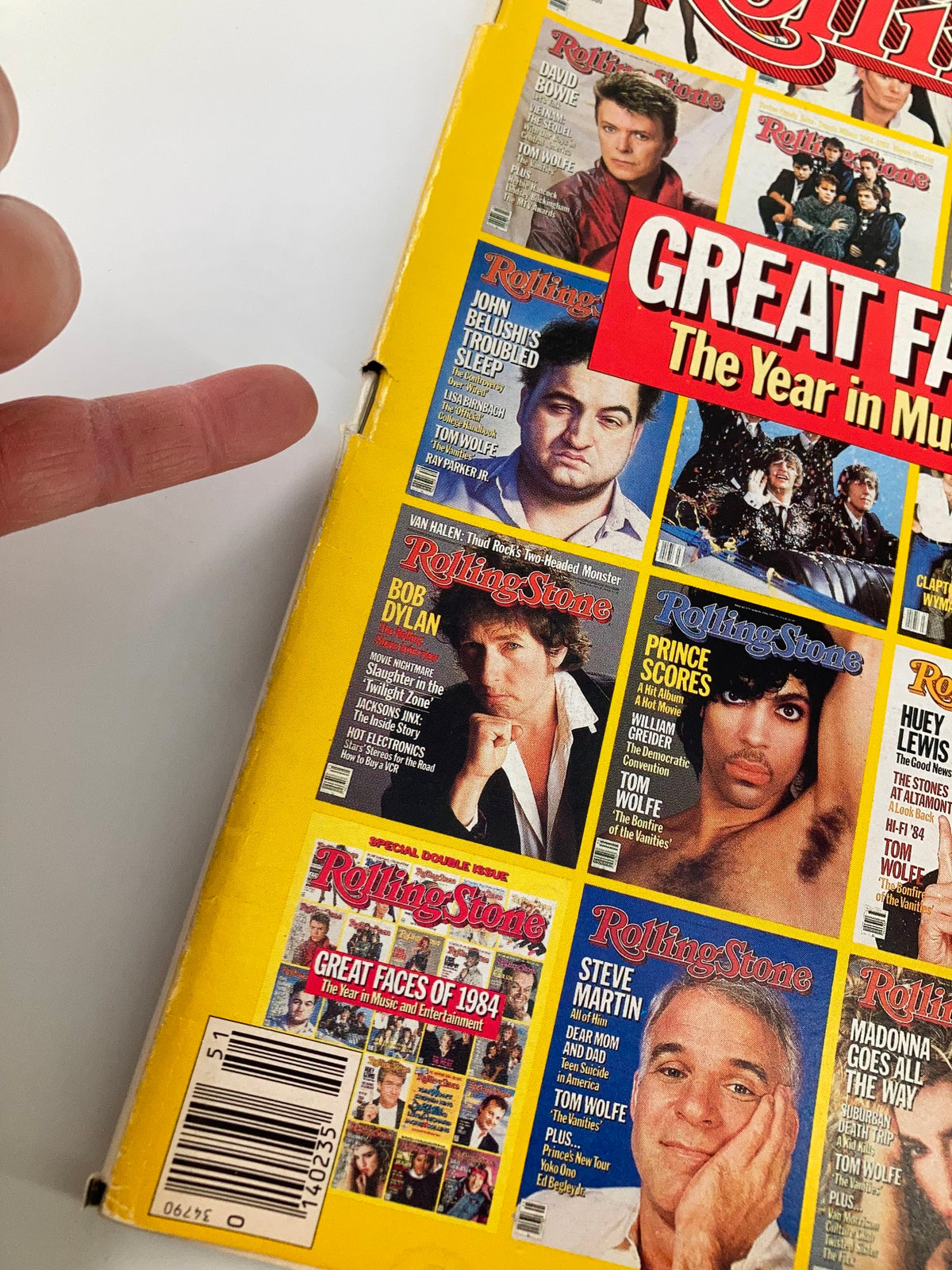Back cover of the VTG Rolling Stone Magazine December 20 1984 titled 'Great Faces of 1984'. Features images of iconic musicians and celebrities from the 1980s, showcasing a collage of music history and cultural influence.