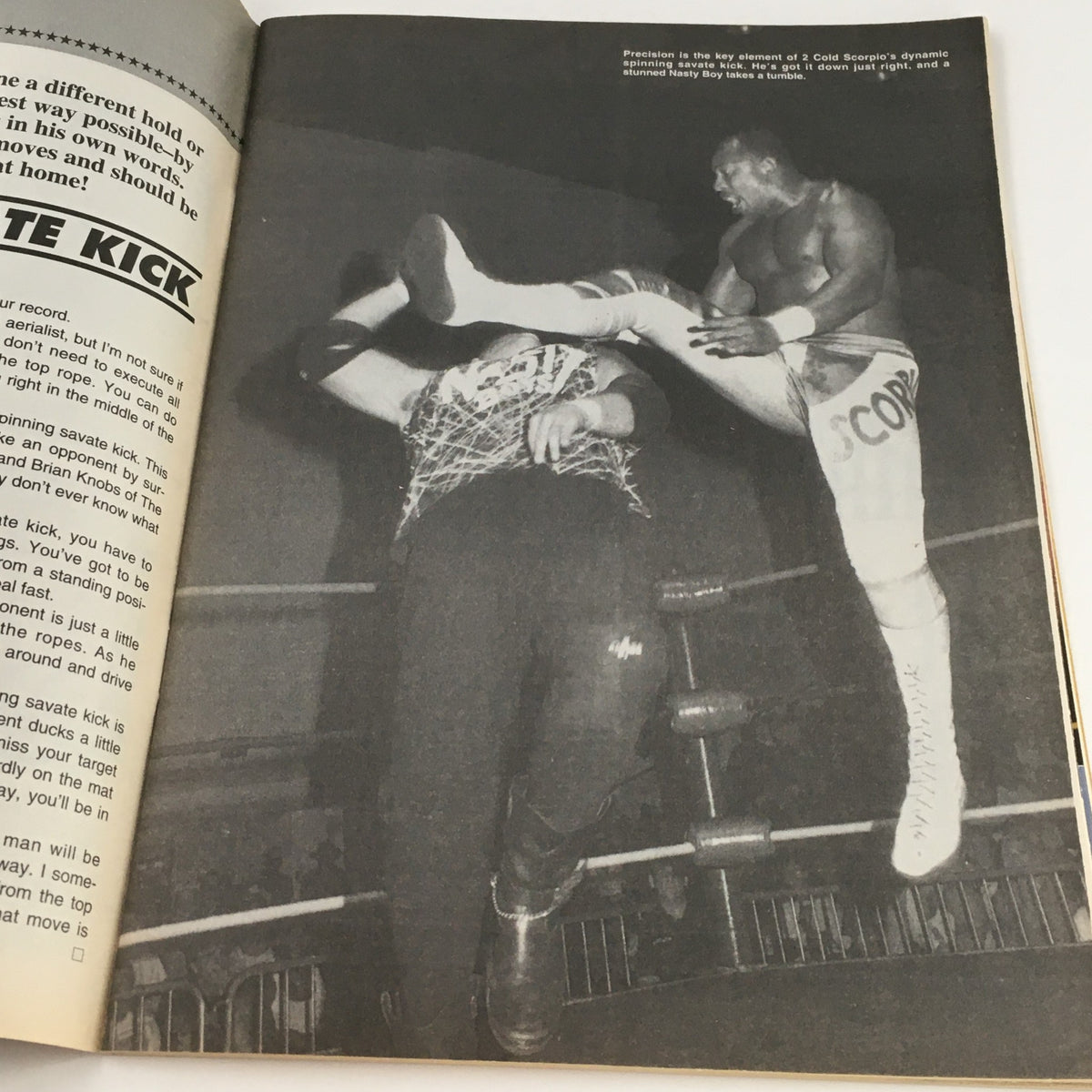 Image of 2 Cold Scorpio executing a spinning savate kick in a wrestling match, as featured in Wrestling Superstars Magazine Spring 1994.