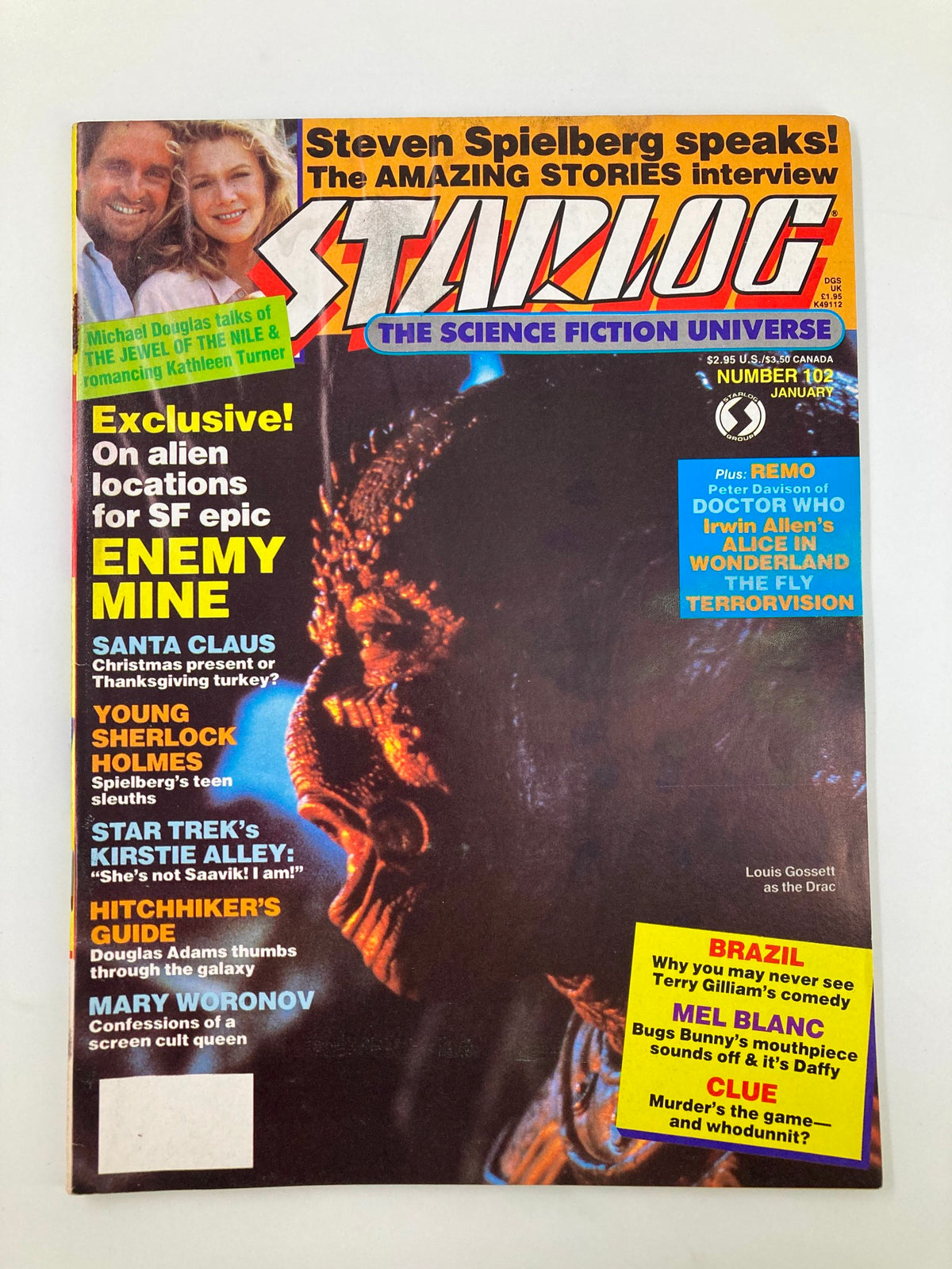 VTG Starlog Magazine January 1986 #102 featuring cover art with Michael Douglas and a science fiction theme, highlighting interviews with Louis Gossett Jr. and articles on alien locations for SF epic Enemy Mine.