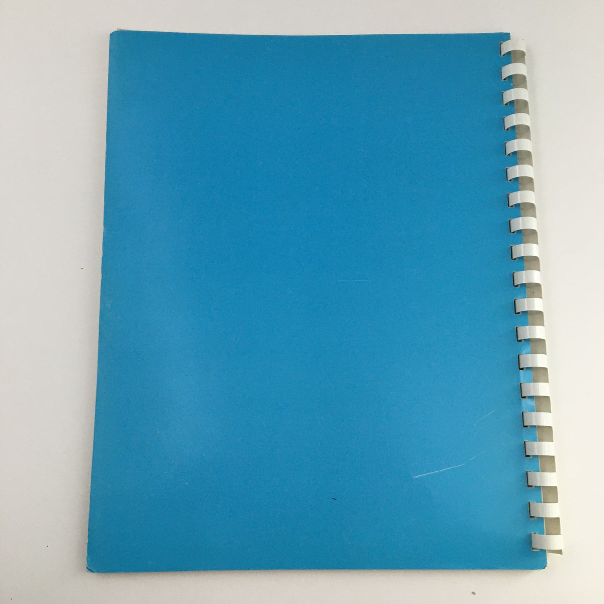 The back cover of the North American Presents September 1979 Riverboat Filksing Souvenir Programme, featuring a plain blue design.