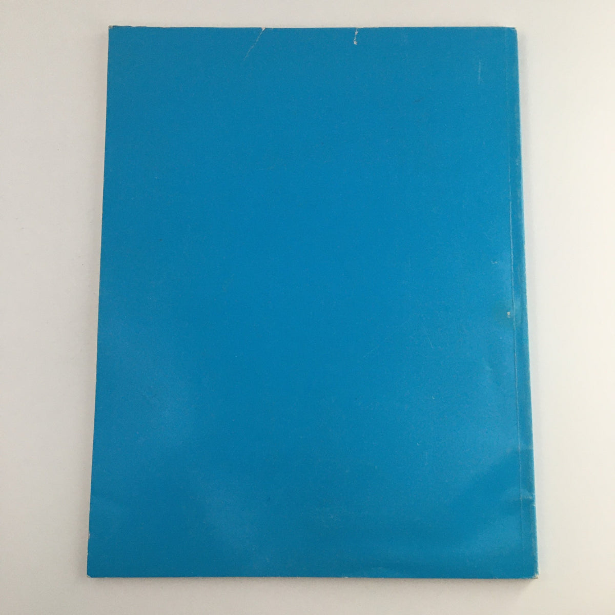 The back cover of the 1988 A New Settlement of Old Scores by John Brunner, highlighting the vintage magazine's design and preservation in good condition.
