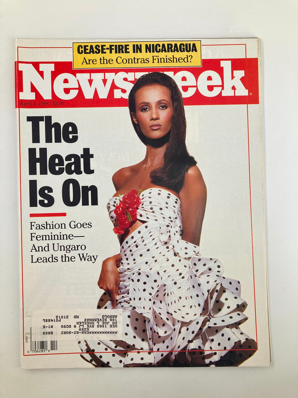 VTG Newsweek Magazine April 4 1988 cover featuring a model in a polka dot dress, emphasizing the theme 'Fashion Goes Feminine' with designer Emanuel Ungaro leading the way. Ideal for collectors and fashion enthusiasts.