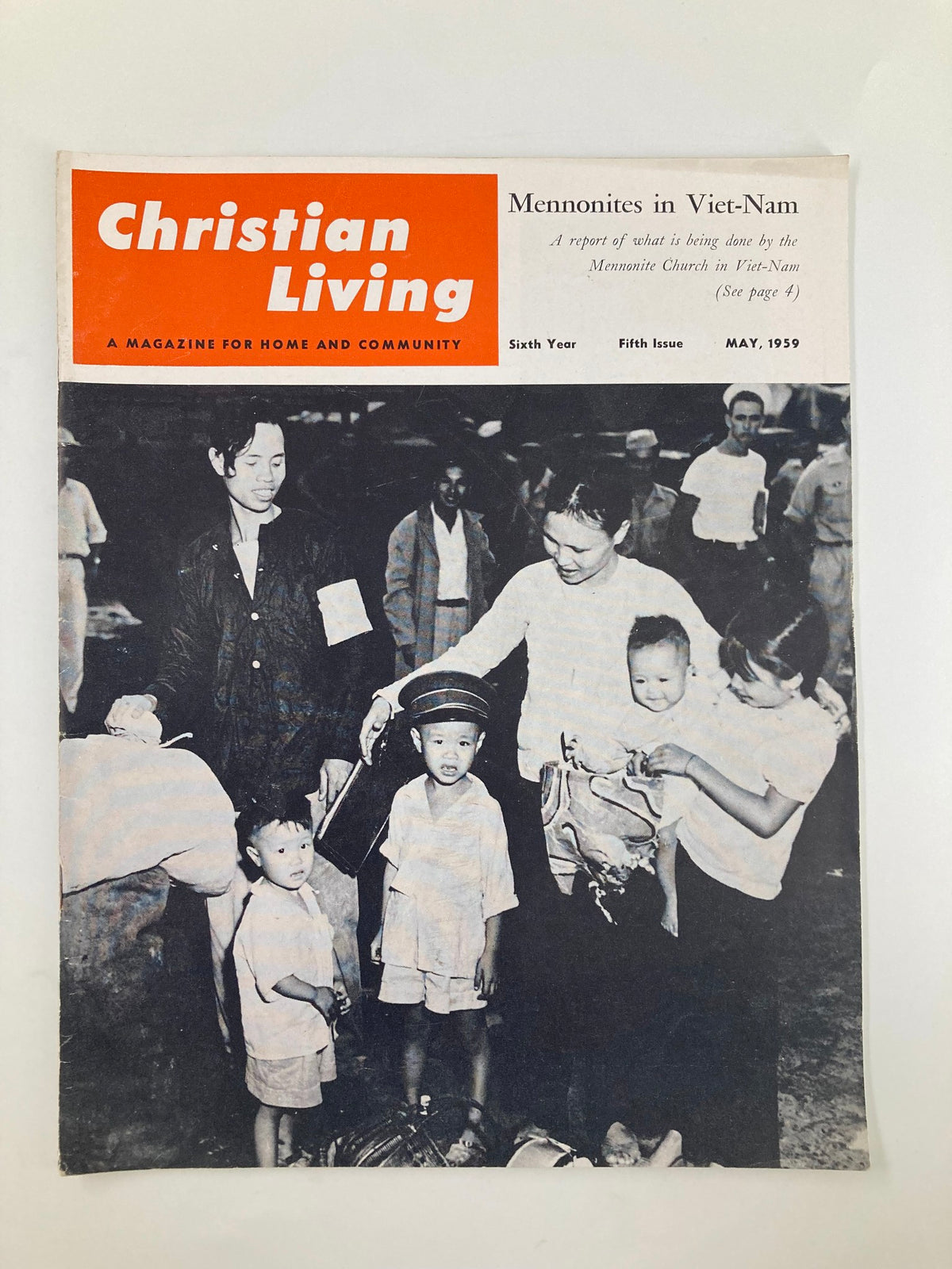 Cover of VTG Christian Living Magazine from May 1959 featuring the article 'Mennonites in Viet-Nam', showcasing a community scene with children and adults.