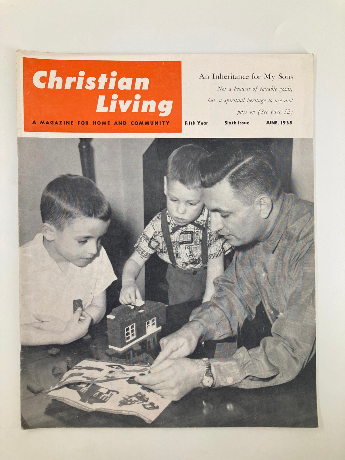 Cover of the VTG Christian Living Magazine from June 1958, featuring the title 'Spiritual Inheritance for My Sons'. The cover includes an image of a father engaging with two young boys in a play activity.
