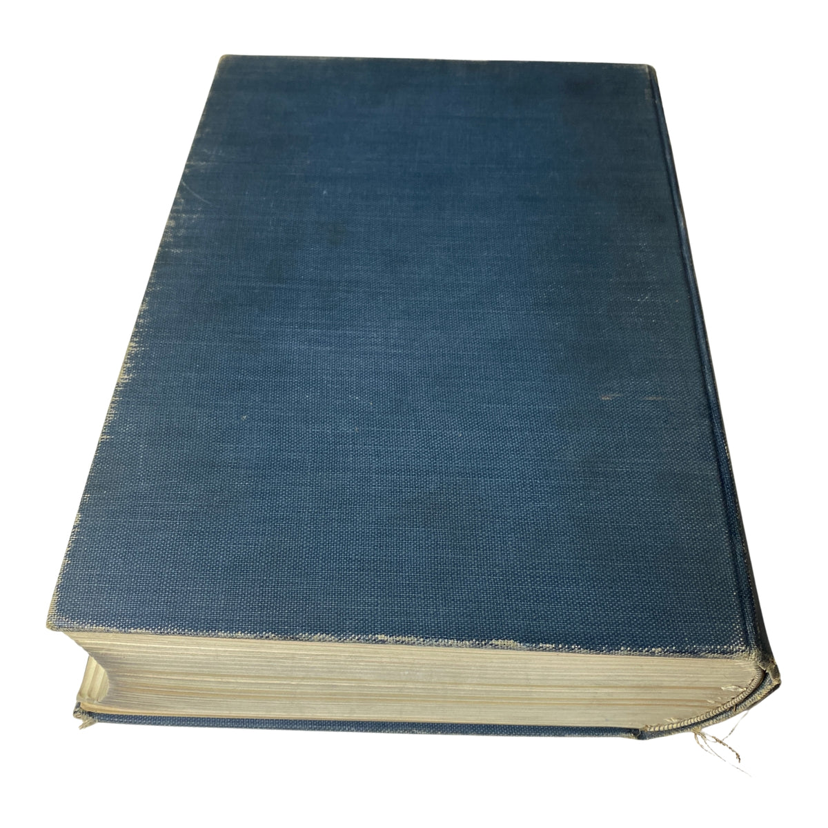 Close-up view of the bound volume of Time Magazine, featuring issues from July 7, 1930 to December 29, 1930, showcasing its blue cover and worn edges.
